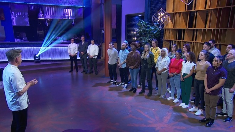 Gordon Ramsay speaking to chef contestants on Hell's Kitchen