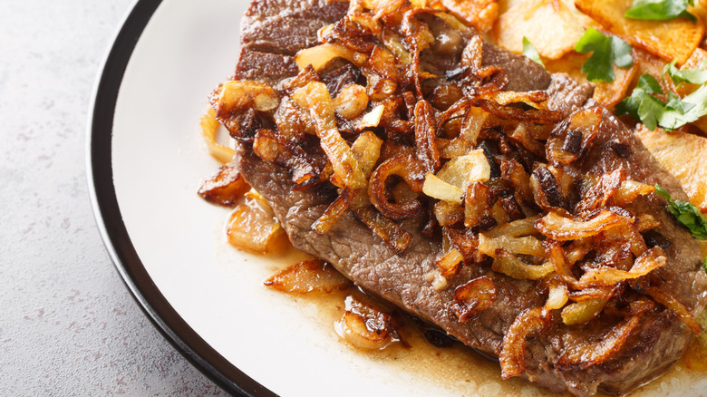 Hamburger steak topped with sauteed onion.