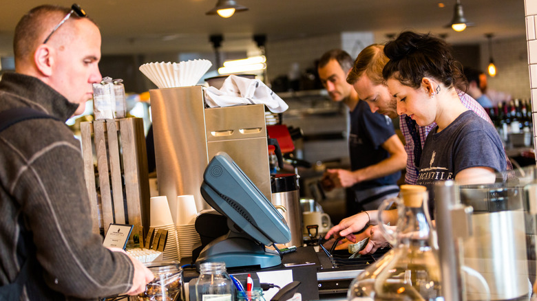 customer standing at Mercantile restaurant