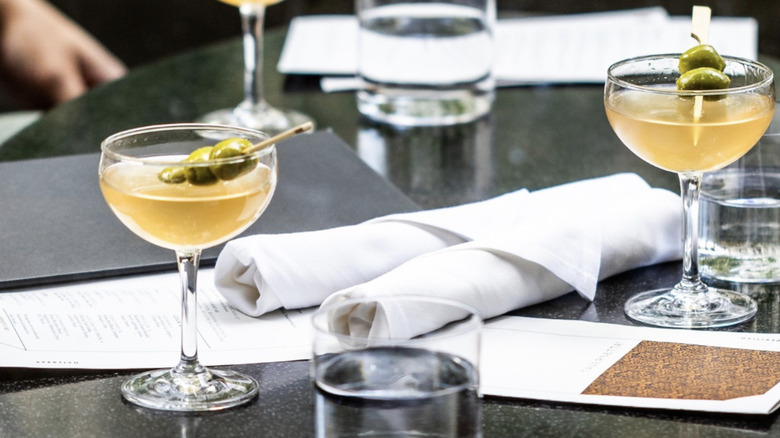 cocktail glasses served on table