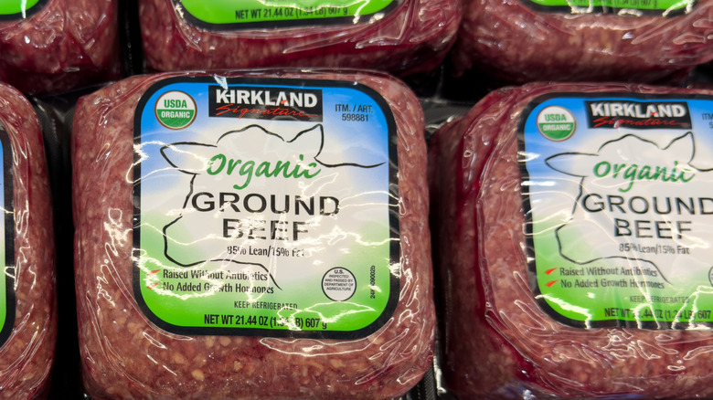 A package of Kirkland Signature organic ground beef with information on the label such as 85% lean 50% fat, raised without antibiotics, no added growth hormones