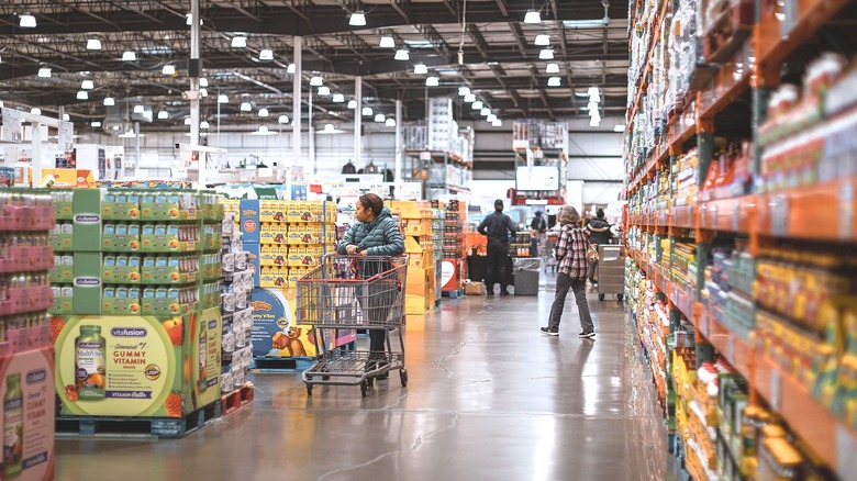 Large Costco warehouse with shoppers