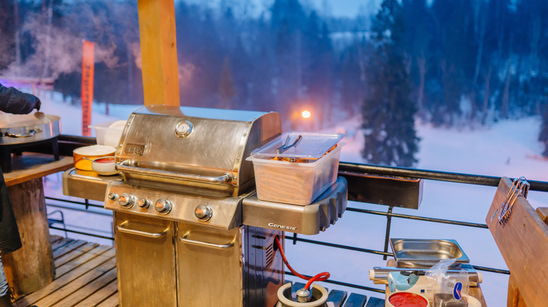 Propane grill on winter deck