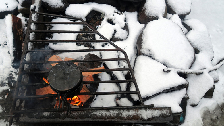 Snow accumulated on outdoor grill