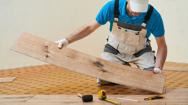 Installing vinyl flooring in kitchen