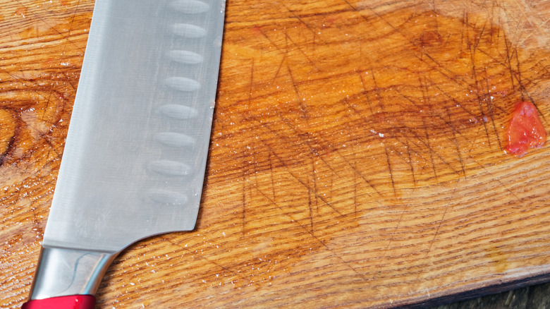 Knife marks on wooden cutting board