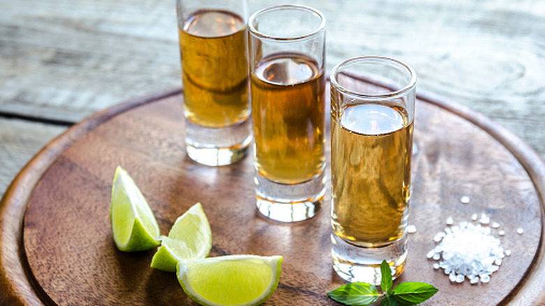 Ages tequila with a golden brown hue.