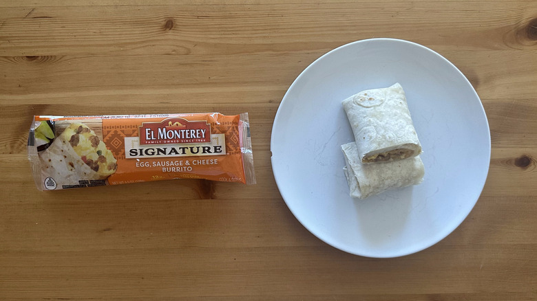 El Monterey Egg, Sausage, and Cheese Burrito on white plate on table