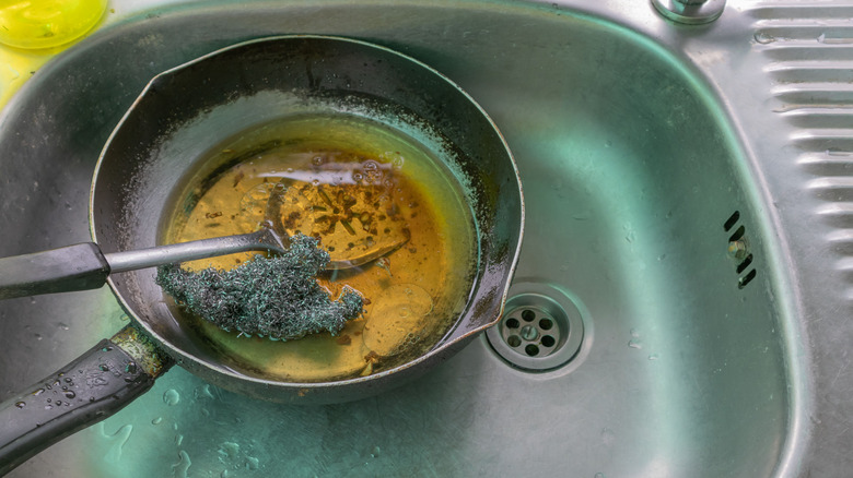 Grease in a pan in the sink
