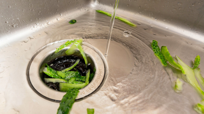 Food being built up in a running sink