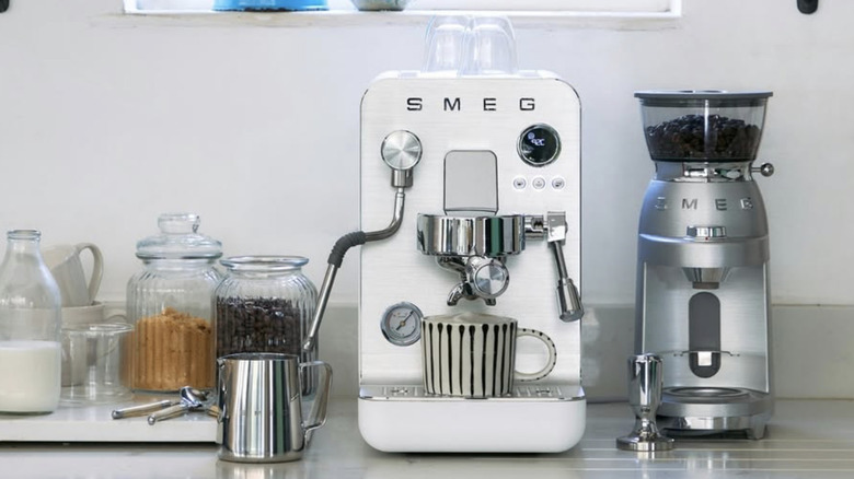 A Smeg espresso machine on a kitchen counter
