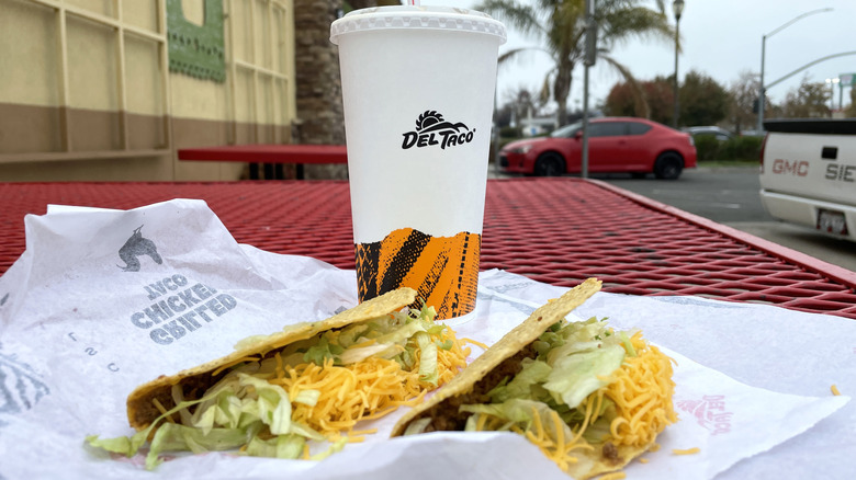 Del Taco combo meal on a table outdoors