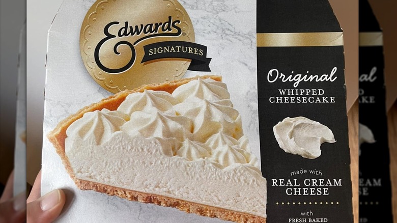 A box of Edwards Original Whipped Cheesecake featuring the image of a single slice of white cheesecake