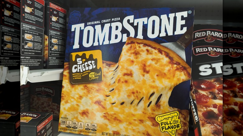 Tombstone brand 5 Cheese pizza in the freezer at the grocery store