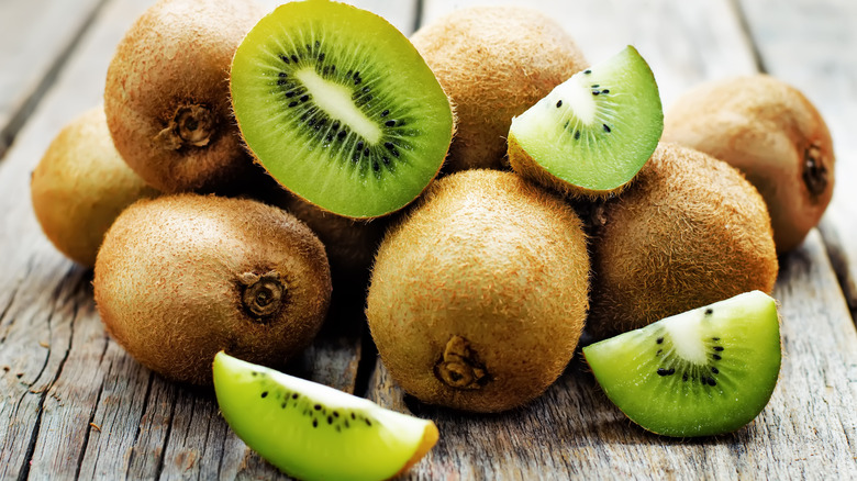 Kiwi fruits on a wooden table
