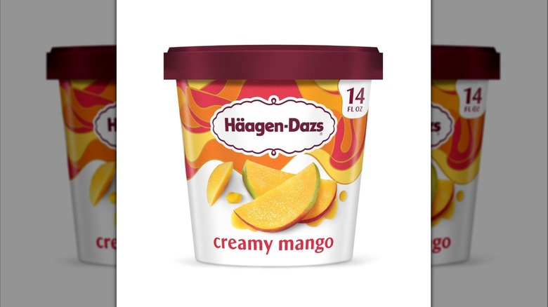 A pint of Häagen-Dazs Creamy Mango ice cream on display