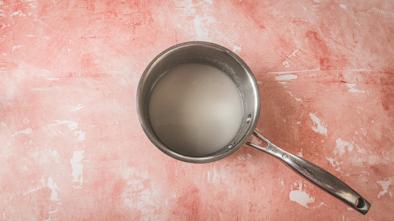 Sugar and water in saucepan