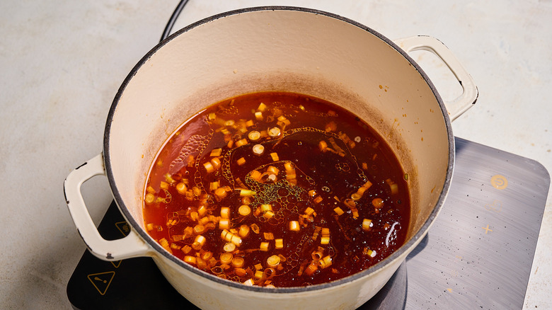 wonton soup broth in the pot