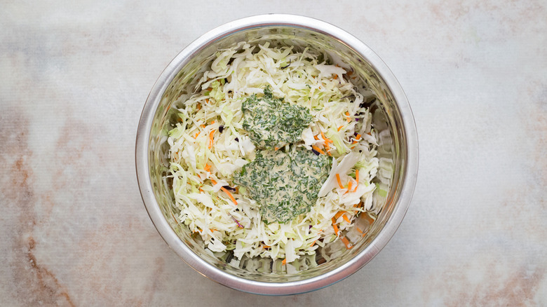 coleslaw and dressing in bowl