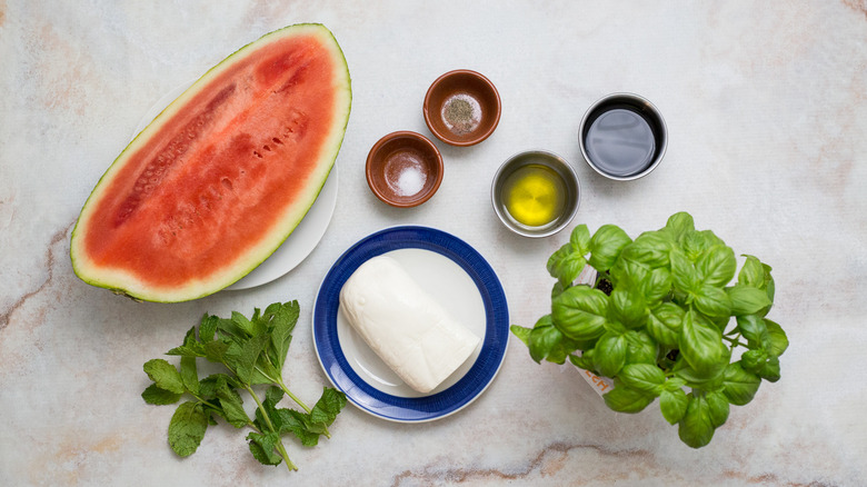 watermelon caprese salad ingredients on table