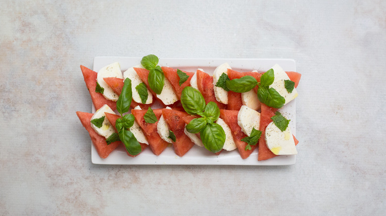 watermelon salad on white plate