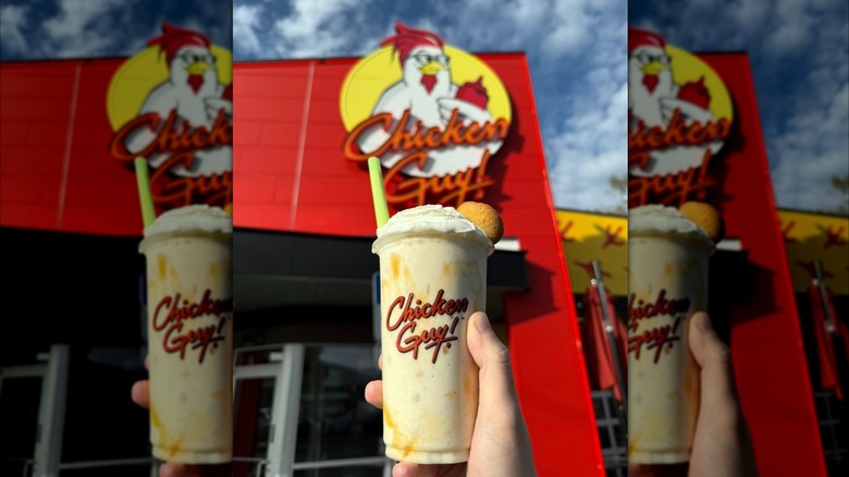 Hand holding the Banana Pudding shake at Chicken Guy!