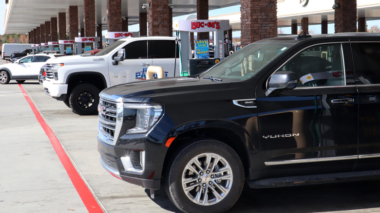 Gas pumps filled with vehicles at Buc-ee's filling stations
