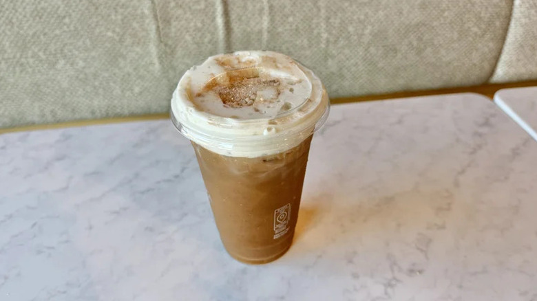 Panera Pumpkin Spice Iced Coffee on white table