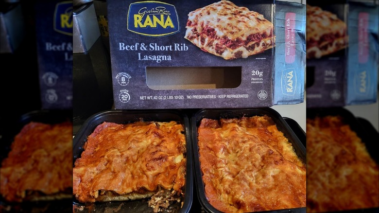 An empty box of Giovanni Rana Beef & Short Rib Lasagna with the prepared lasagna in front of the box