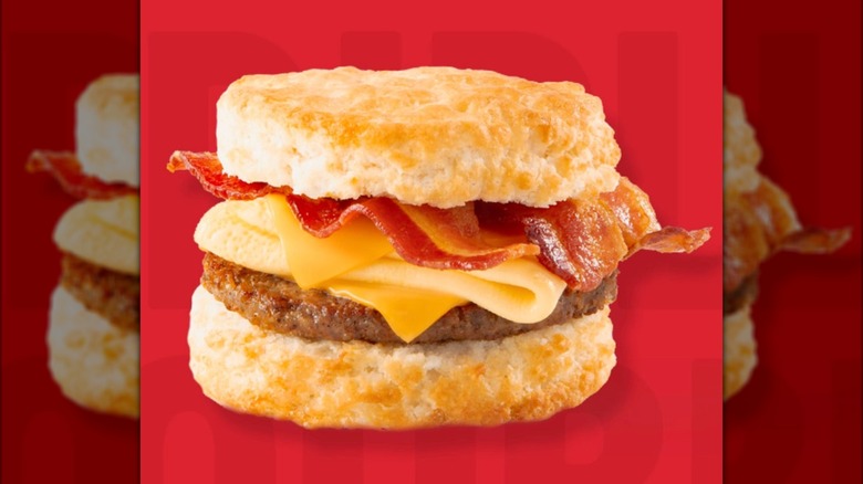 Bojangles Triple Double Biscuit breakfast sandwich on red background