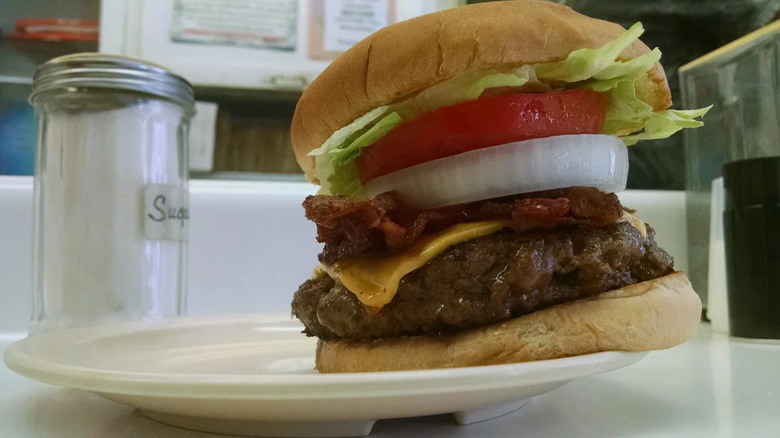 A cheeseburger on a plate at Bill's Toasty