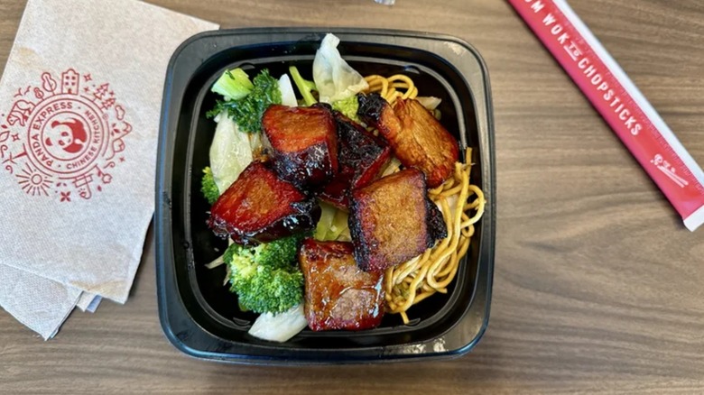 Panda Express Cantonese BBQ Brisket with a set of chopsticks