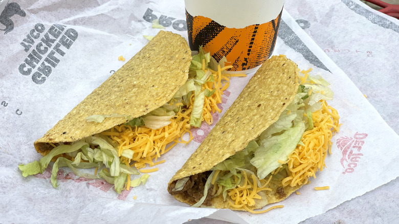 Del Taco tacos with a drink on the side