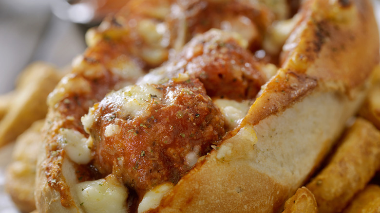 Closeup of a toasted meatball sandwich.