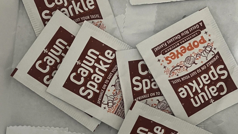 Scattered Popeyes Cajun Sparkle packets