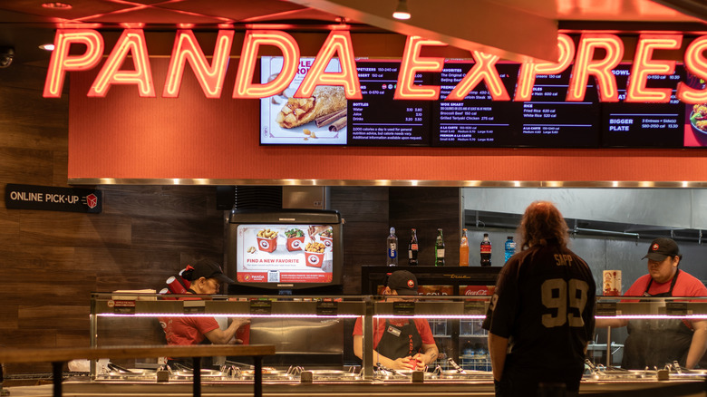 Someone ordering food at Panda Express