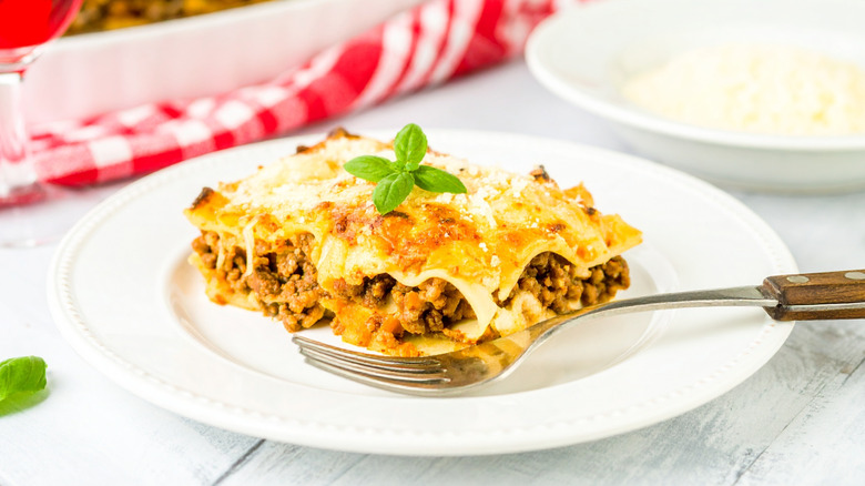 Lasagna alla Bolognese placed on a white plate