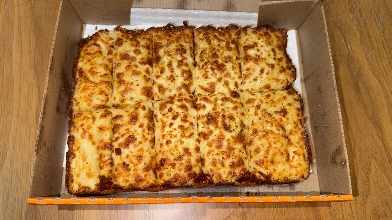 Little Caesars Italian Cheese Bread in a cardboard box.
