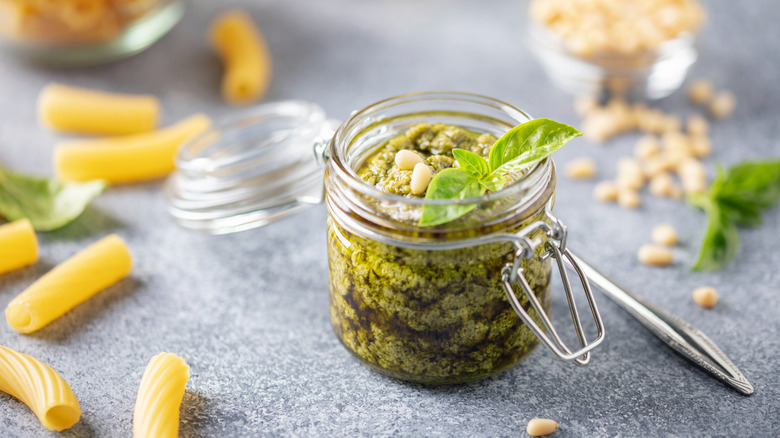 Pesto in a jar with pasta noodles