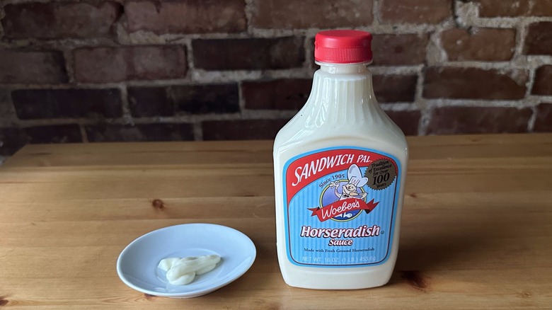 Woeber's Sandwich Pal Horseradish Sauce on wooden table