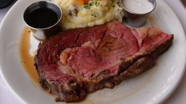 Prime rib dish with mashed potatoes