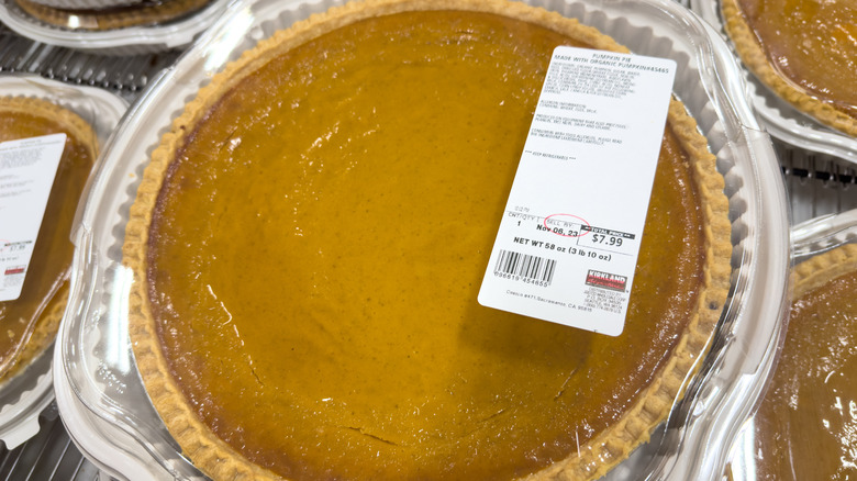 A close up of a Kirkland Signature pumpkin pie at Costco.