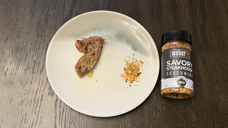 Weber Savory Steakhouse Seasoning on steak cut