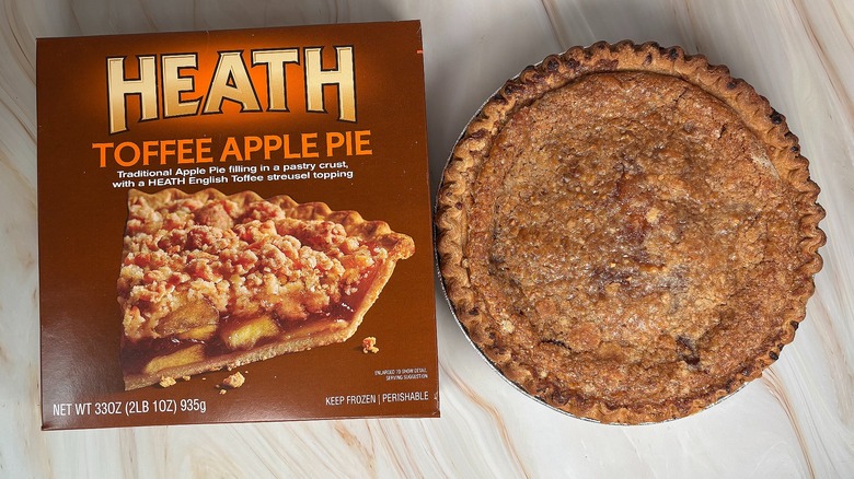 Top-down shot of Heath Toffee apple pie next to box on table