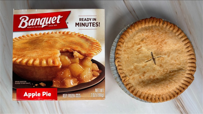 Top-down shot of Banquet apple pie next to box on table