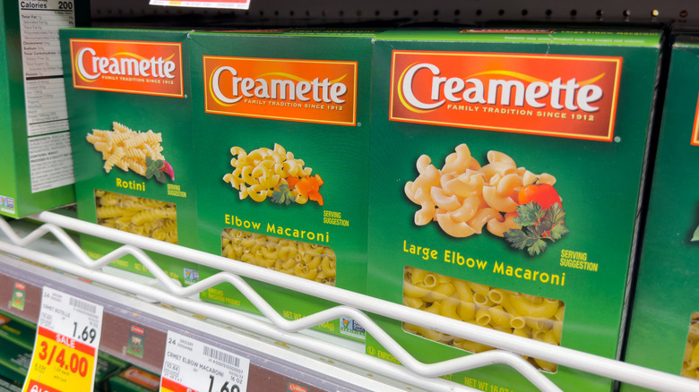 Boxes of Creamette brand rotini and elbow macaroni on the shelves at the grocery store