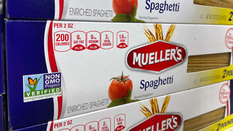 Stacked boxes of Mueller's spaghetti noodles