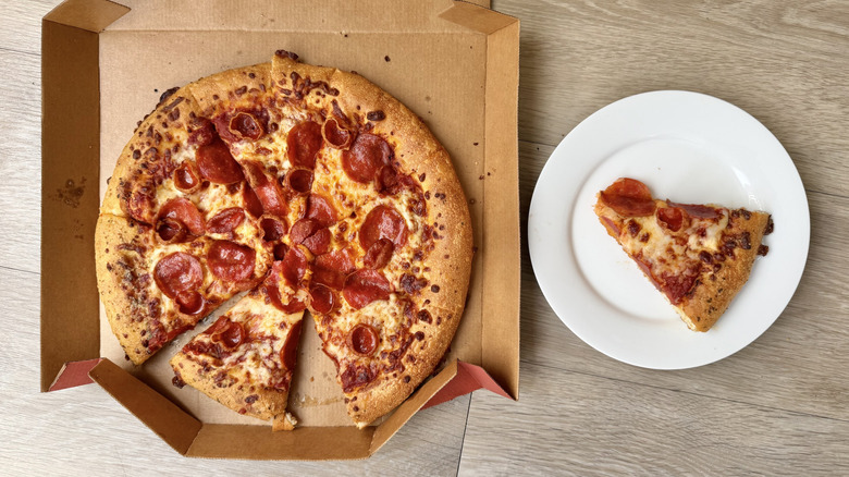 Hand Tossed pizza slice on a plate