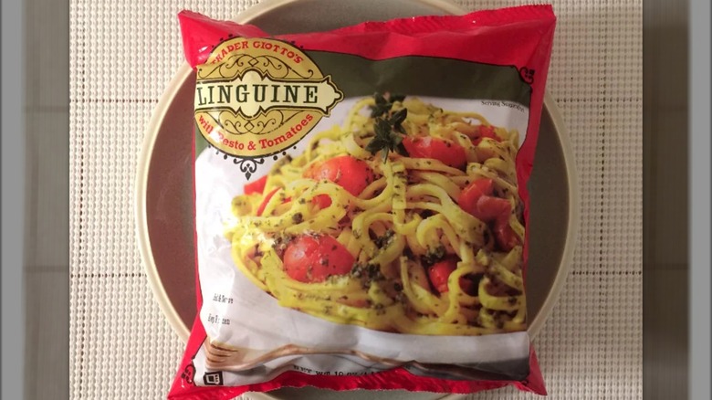 Trader Joe's linguine with pesto and tomatoes in pouch showing image of prepared product