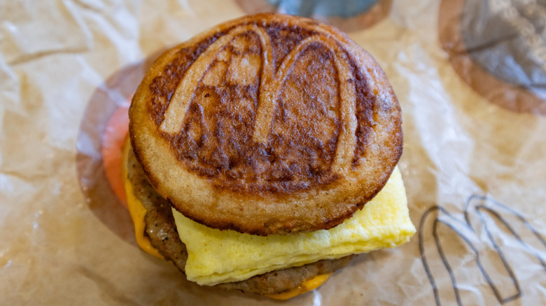 A McDonald's McGriddle sandwich with sausage, egg, and cheese